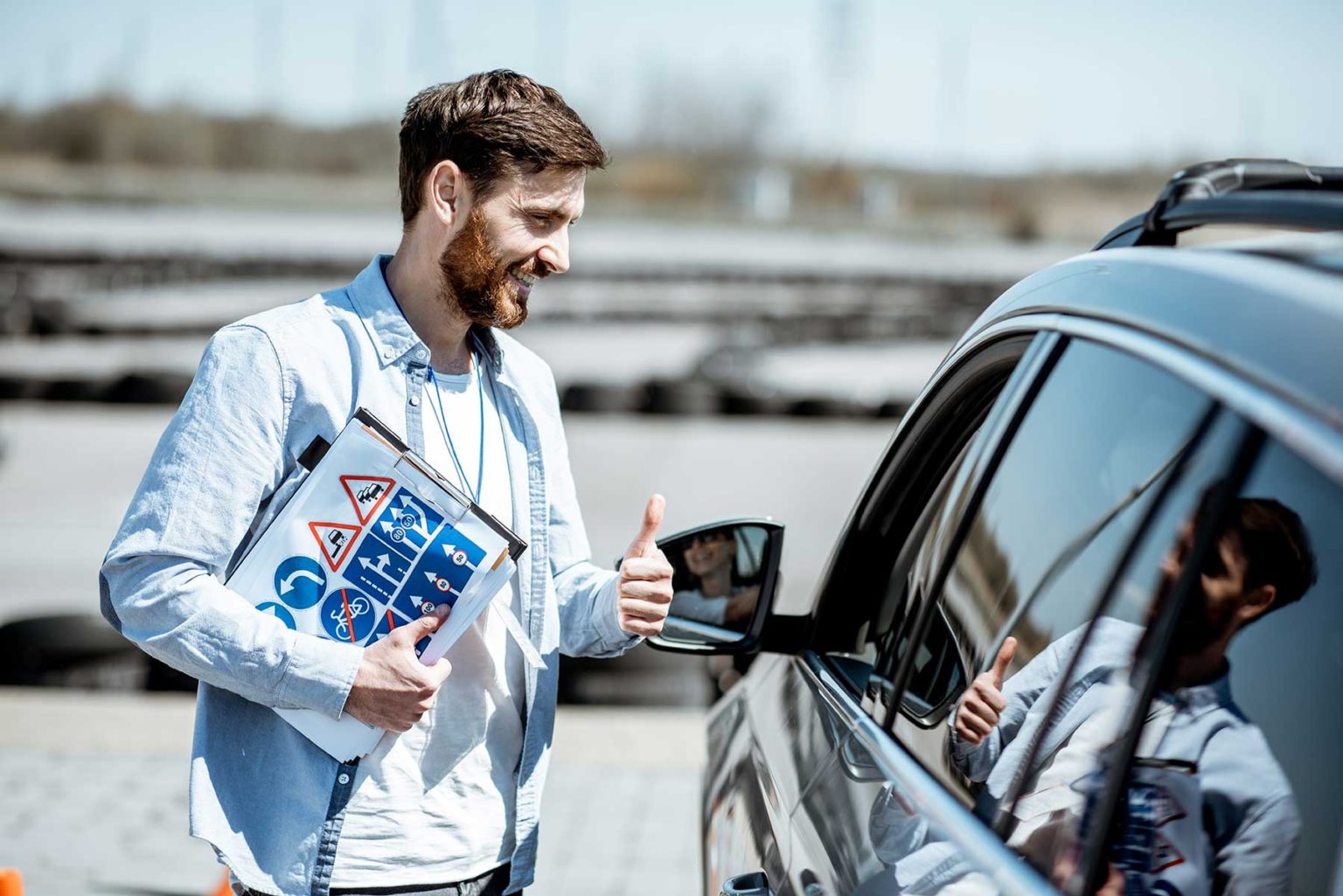 Driving instructor at Golden Wheel Driving school about us page