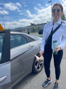 Driving instructor and student in a modern car